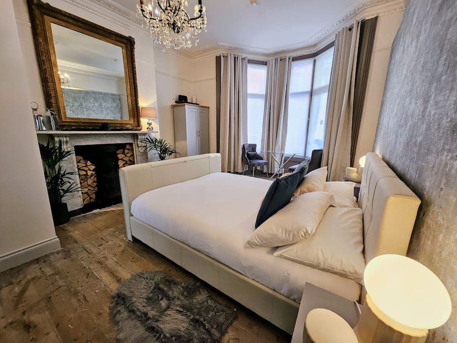 Deluxe Studio | Desk, laptop workspace, blackout drapes, iron/ironing board