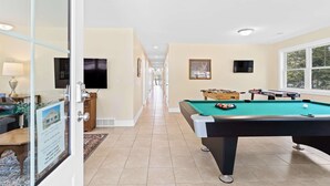 A pool room with a pool table, foosball table, and a television. - Two Homes: 1-Hot Tub; 2-Lakefront w/Dock, Big Yard (Pullman)
