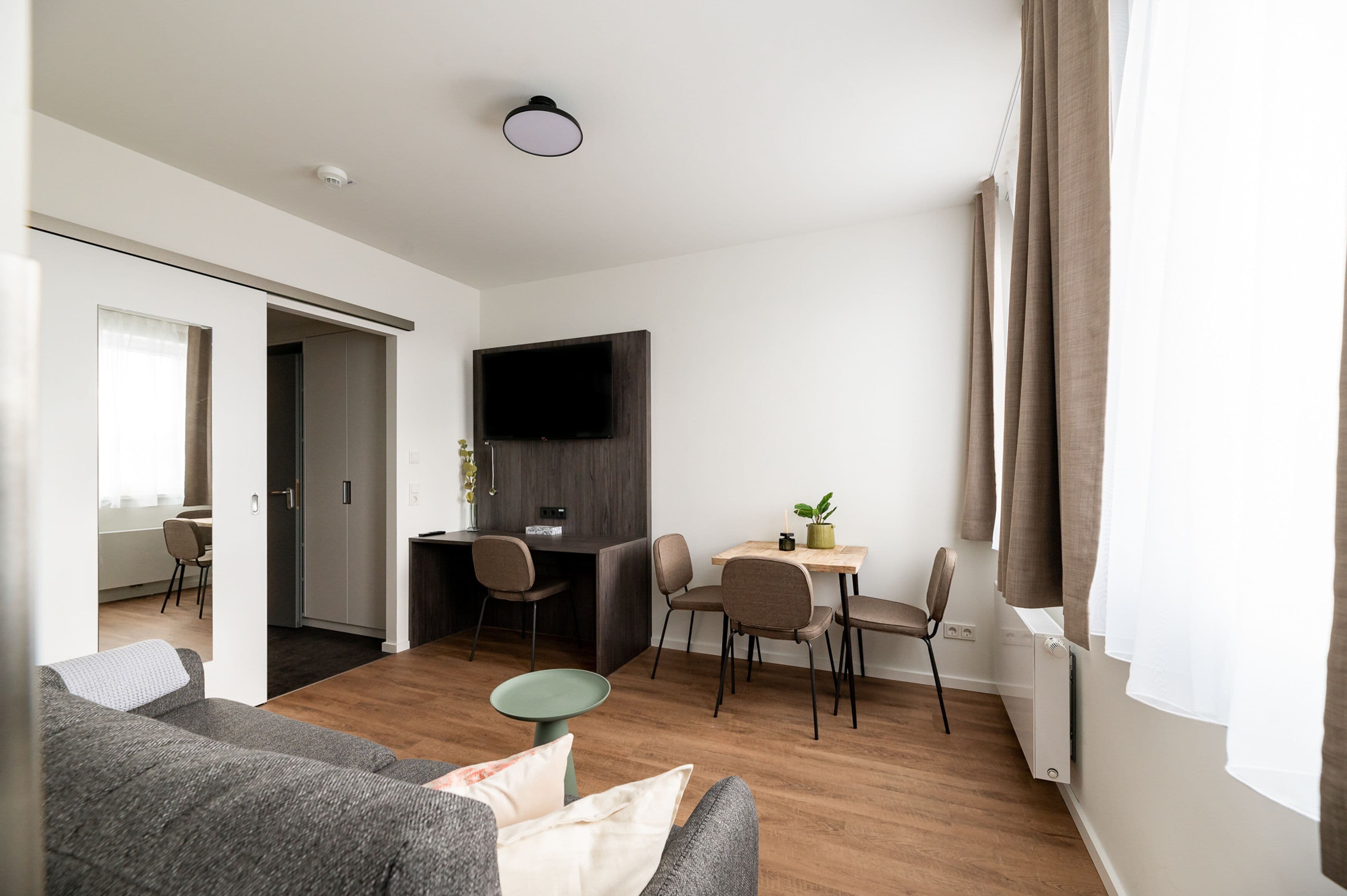 Comfort Suite with sofa bed | Living area | 50-inch TV with satellite channels