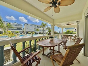 Outdoor dining - Beachfront condo with pool (Simpson Bay)