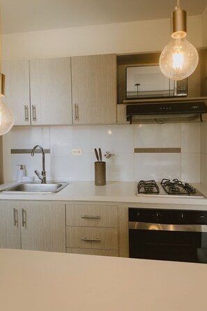 Microwave, oven, stovetop, coffee/tea maker