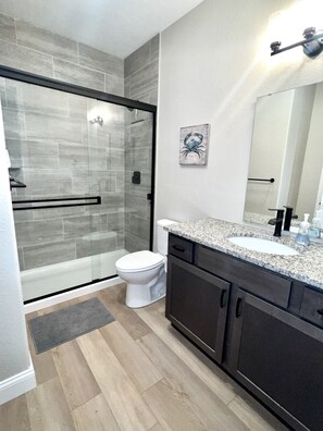 Shower, hair dryer, towels, soap