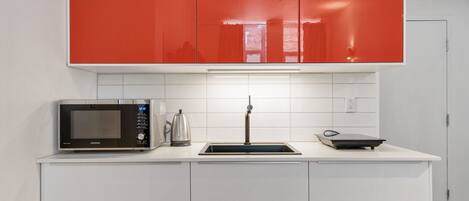 Fridge, microwave, cookware/dishes/utensils