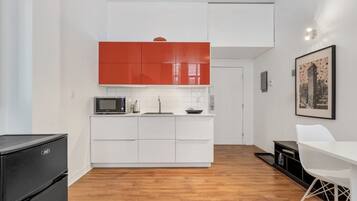 Fridge, microwave, cookware/dishes/utensils