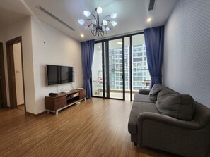 Departamento familiar | Área de sala de estar | Smart TV de 55 pulgadas con canales vía satélite 