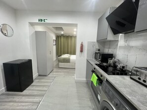 Fridge, oven, electric kettle, toaster