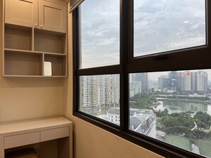 Family Apartment | Desk, laptop workspace, blackout drapes, iron/ironing board - Vinhomes Dcapitale Tran Duy Hung (Hanoi)