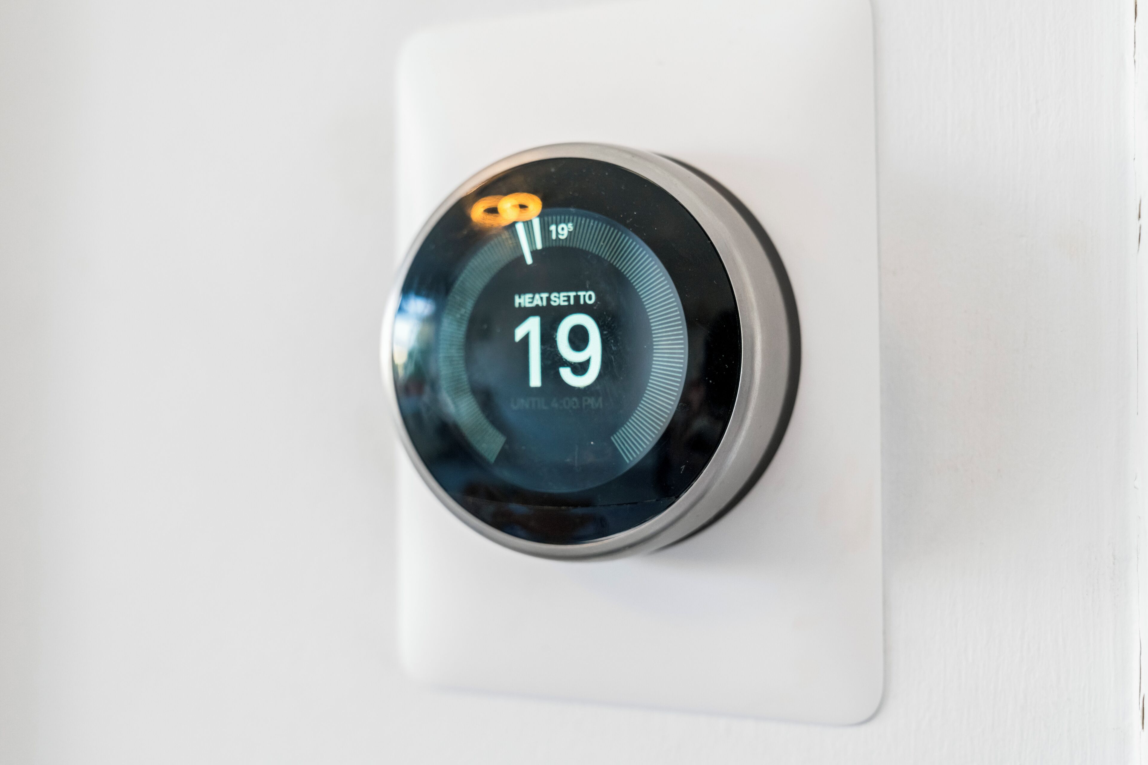 A thermostat set to 19 degrees.