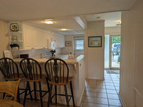 LOCATION-LOCATION across the street from the beach and access to a family pool.