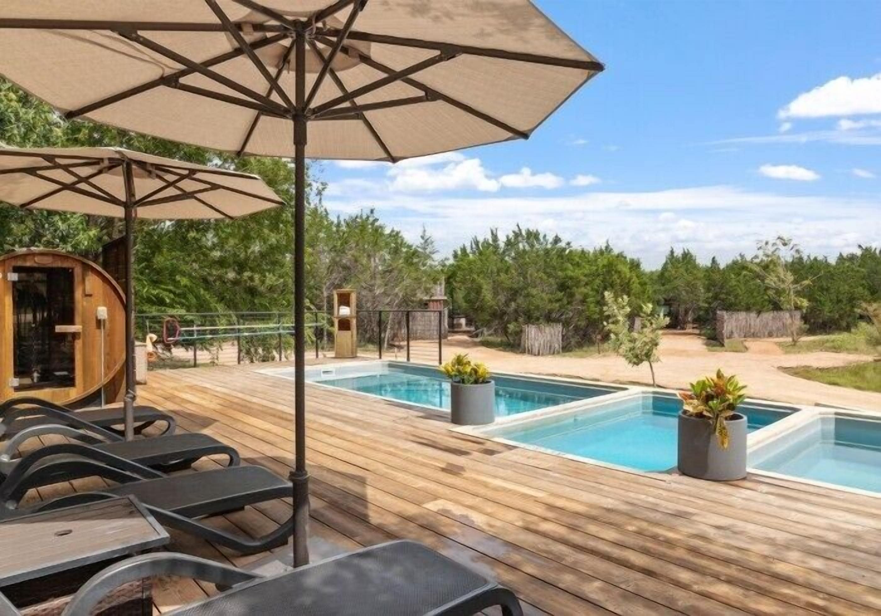 Outdoor pool, open 9:00 AM to 10:00 PM, pool umbrellas, pool loungers