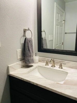 Shower, towels, soap, shampoo