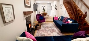 Smart TV, fireplace, books