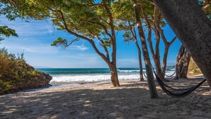 A beach with trees and a hammock. - Ocean front house Punta de Mita (Punta de Mita)