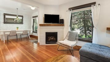 Smart TV, fireplace, books