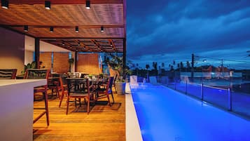 Indoor pool, outdoor pool, pool umbrellas, pool loungers