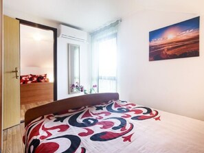 2 quartos, acesso à internet, roupa de cama