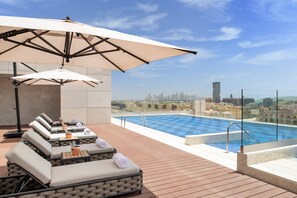 Outdoor pool, open 6:00 AM to 8:00 PM, pool umbrellas, sun loungers