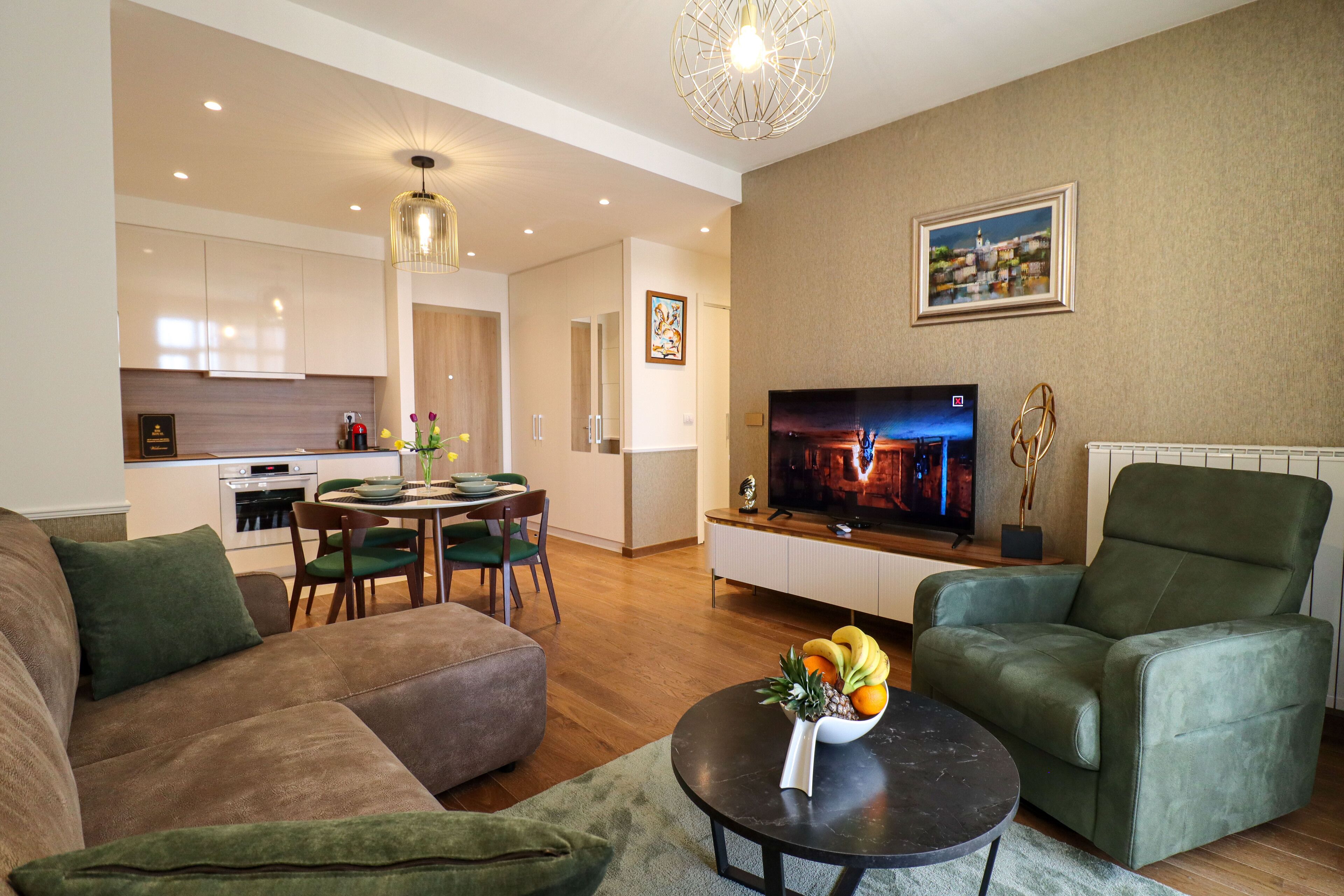 Superior Apartment | Living area | 50-inch Smart TV with cable channels, TV