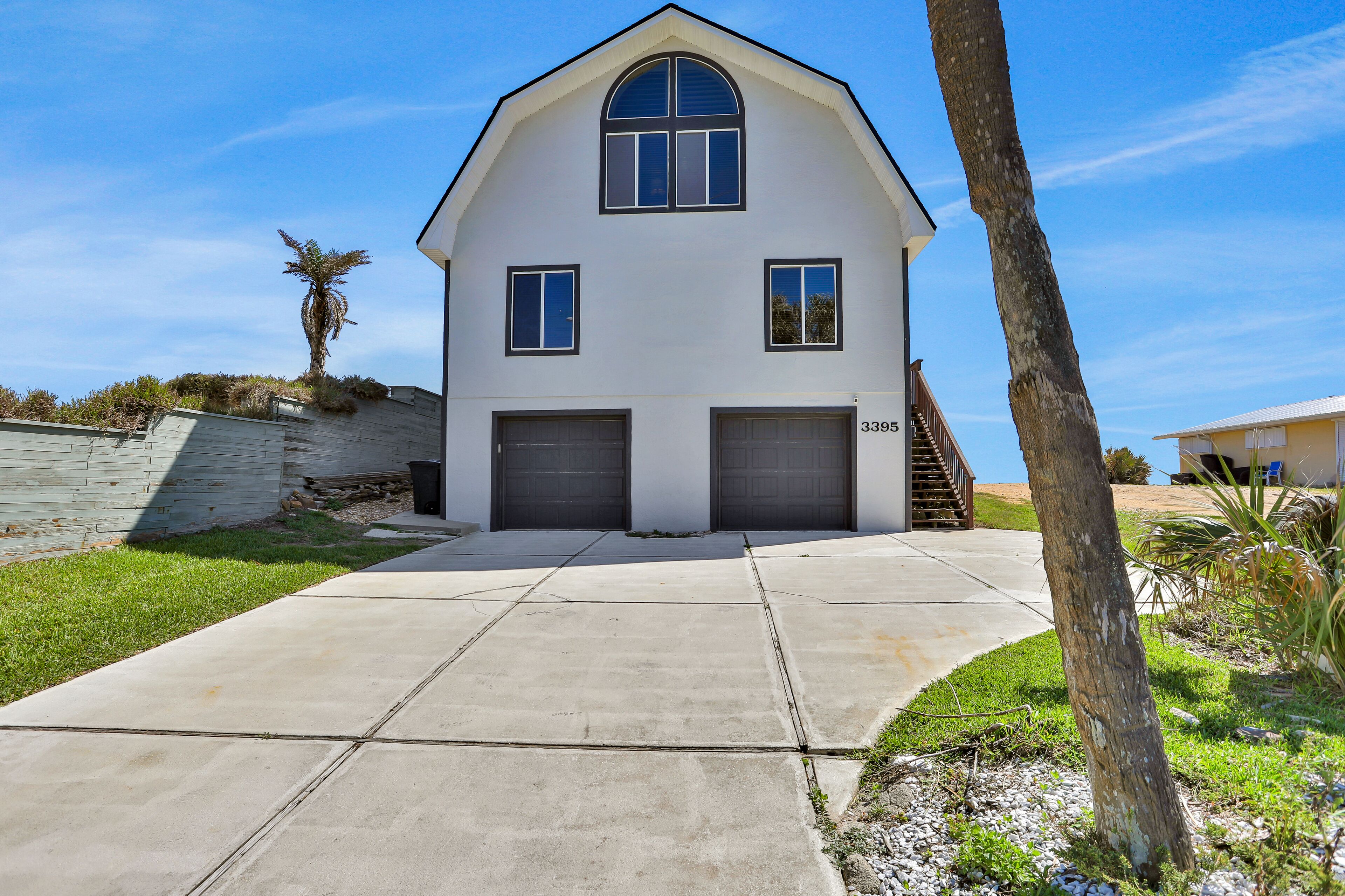 Dog-friendly beachfront home with beach access, decks, grill, fireplace, W/D, AC