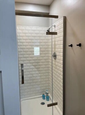 Shower, towels, soap, shampoo