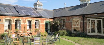 Converted stable block cottage with function room, courtyard garden & woodland