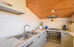 Refrigerador, microondas, parrilla de estufa y lavavajillas 