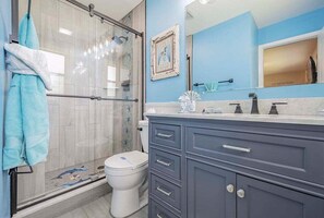 Bathtub, hair dryer, towels