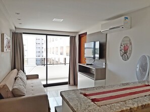 Comfort Apartment | Living area | 42-inch Smart TV with cable channels, TV