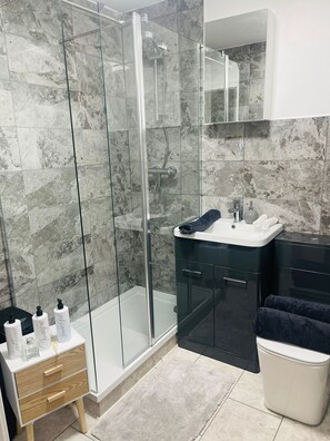 Shower, towels, soap, shampoo