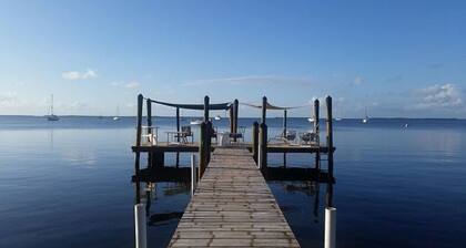 Bayfront Cottage Located on the Bay in Sunset Cove with Sandy Beach