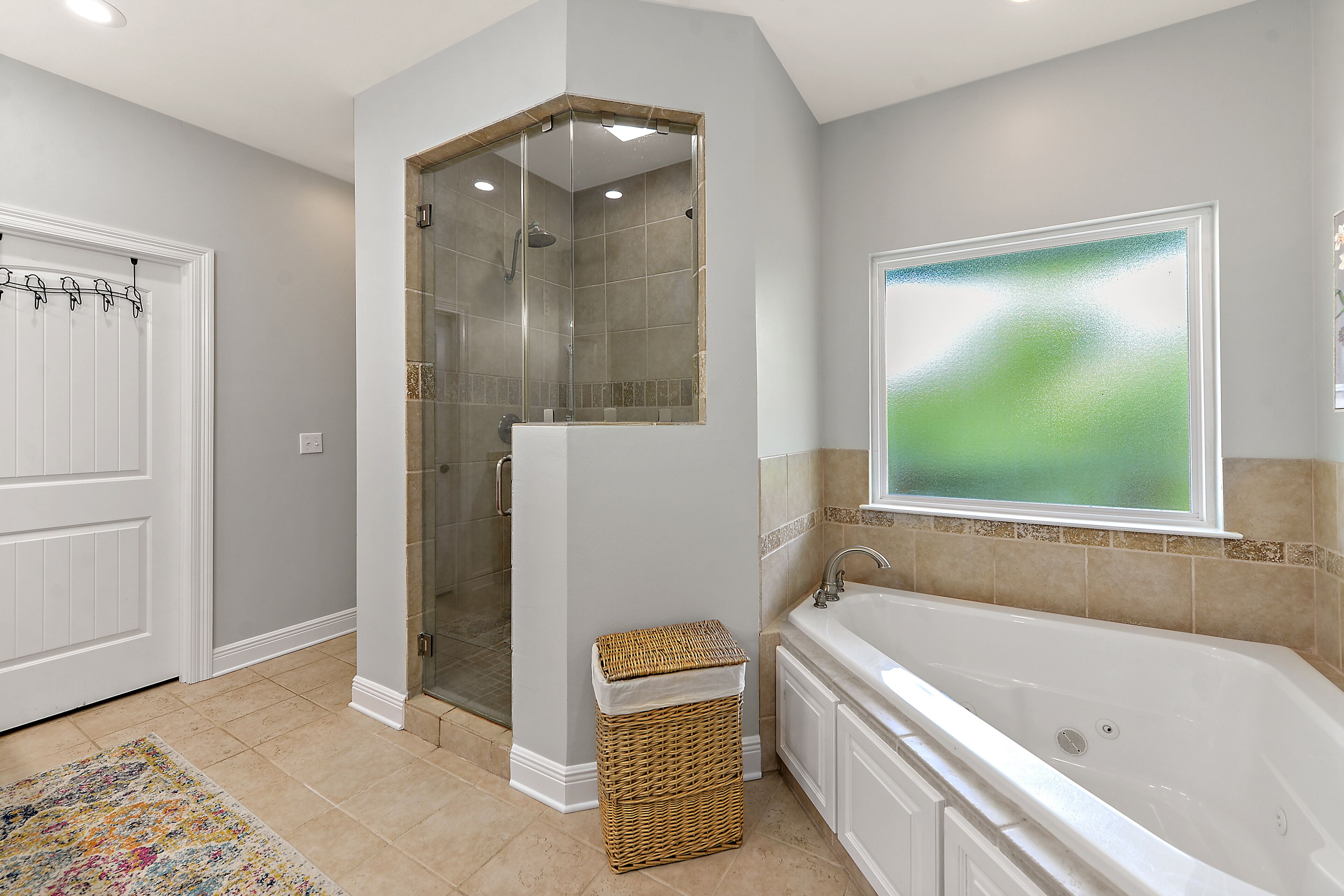 Shower, jetted bath, towels, toilet paper
