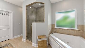 Shower, jetted bath, towels, toilet paper