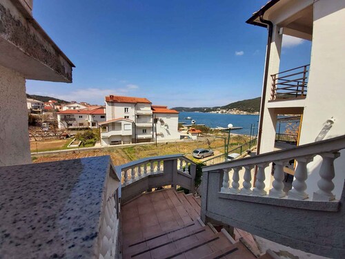 Holiday apartment with boat mooring and sea view