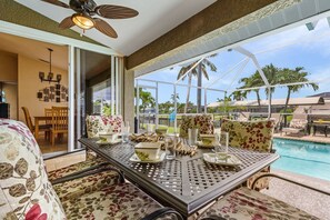 Outdoor dining - Gulf Access, Heated Saltwater Pool - Cape Coastal - Roelens Vacations (Cape Coral)