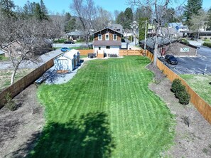 Stroll through the well-manicured lawn and enjoy the peaceful surroundings of this charming home.
