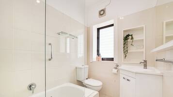Hair dryer, towels, soap, shampoo