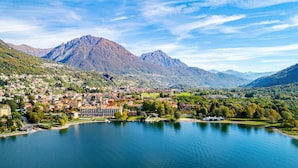 A lakeside town with a prominent mountain in the background. - Porto Letizia Verdi 5, Porlezza, Italy (Porlezza)