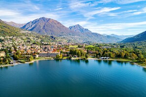 A lakeside town with a prominent mountain in the background. - Porto Letizia Chopin 5, Porlezza, Italy (Porlezza)