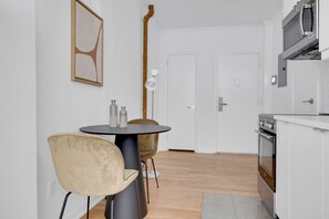 Fridge, microwave, oven, stovetop - Sleek Nolita 1BR w/ W/D, walk to SoHo & Little Italy, by Blueground (Downtown)