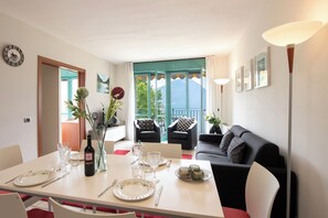 Enjoy meals in this stylish dining area with a beautiful view of the surrounding mountains and lush greenery.