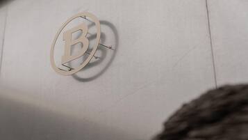 A logo on a wall.