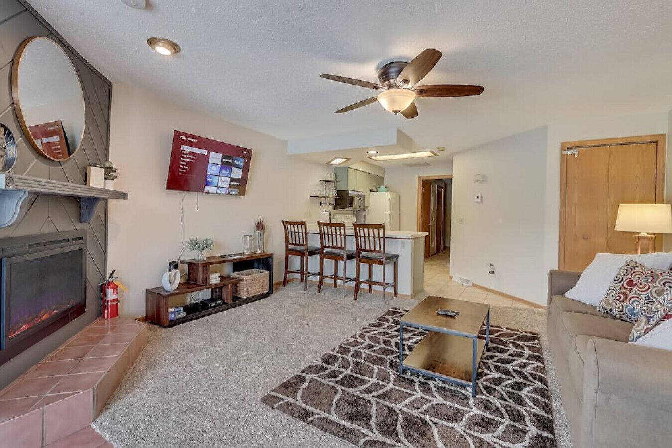 Smart TV, fireplace, books