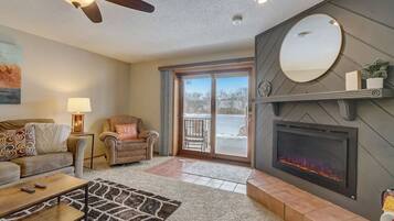 Smart TV, fireplace, books