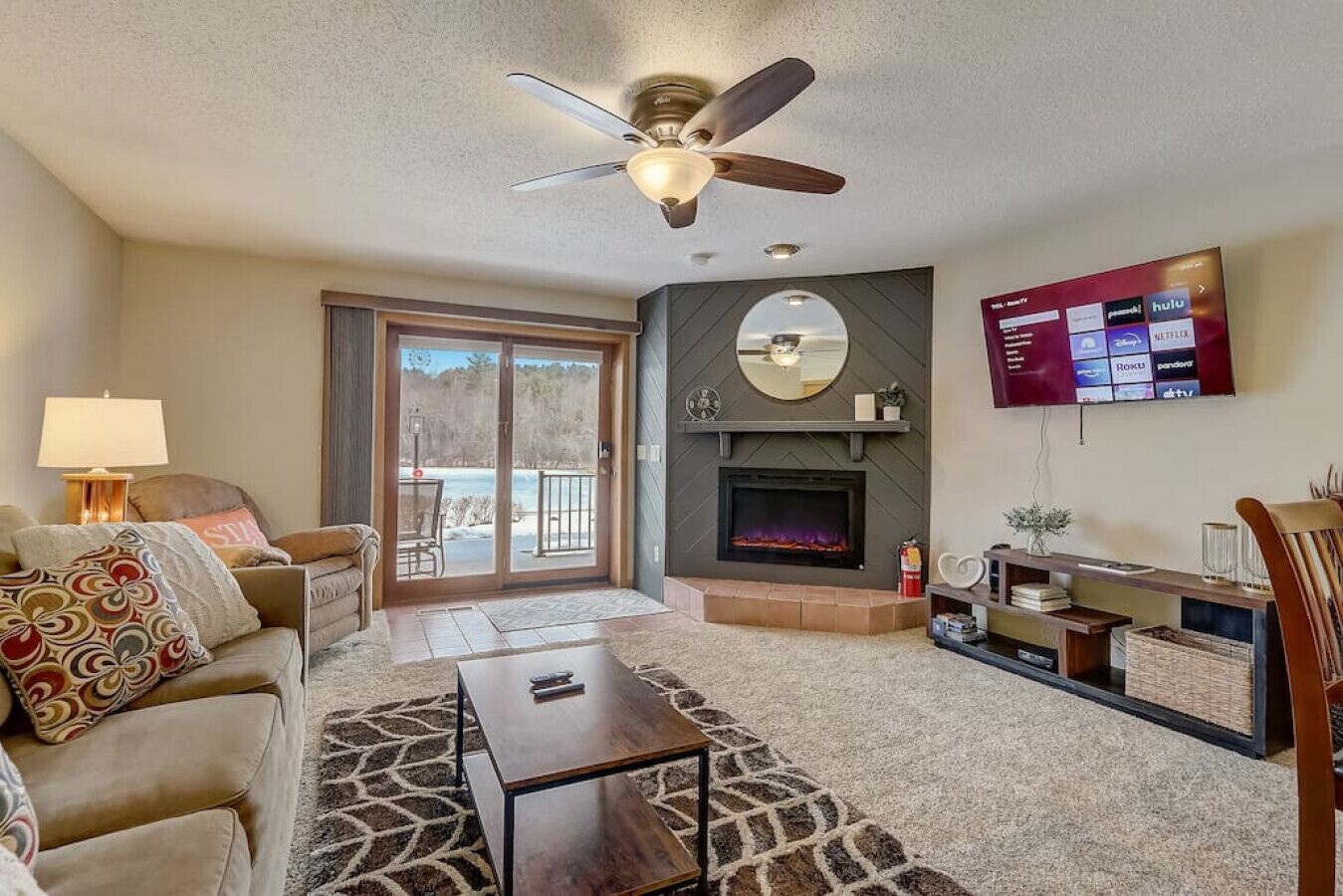 Smart TV, fireplace, books