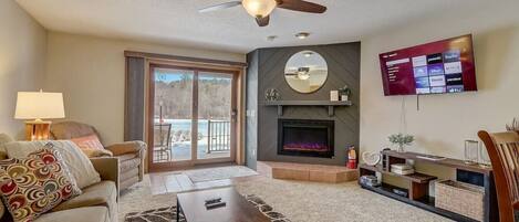 Smart TV, fireplace, books