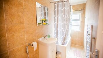 Hair dryer, towels, soap, shampoo
