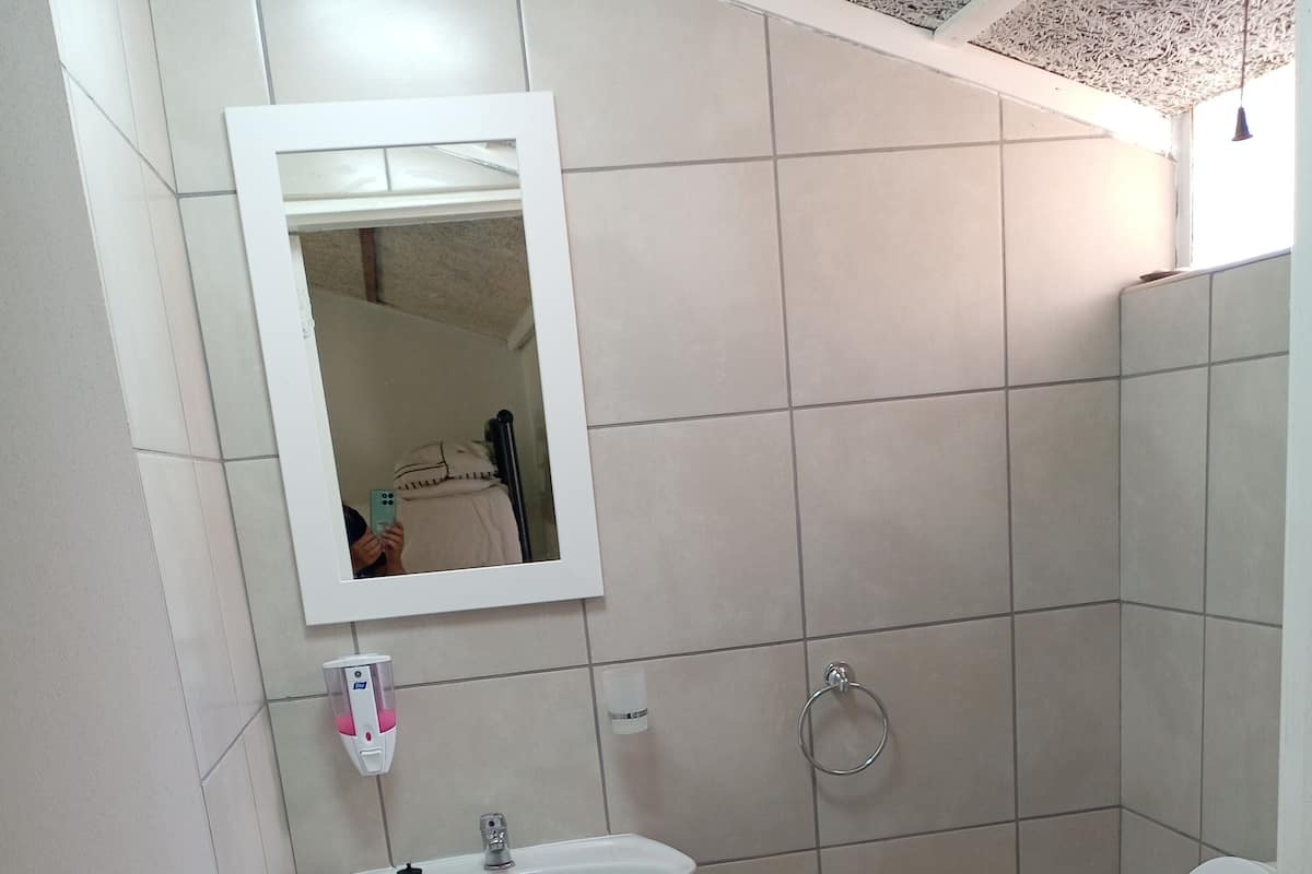 Standard Quadruple Room | Bathroom | Shower, towels, toilet paper