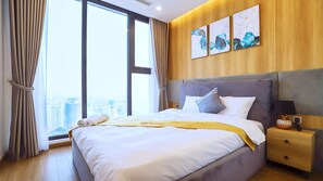 Desk, laptop workspace, blackout drapes, soundproofing - Hi.Home Apartment at Vinhomes Metropolis (Hanoi)