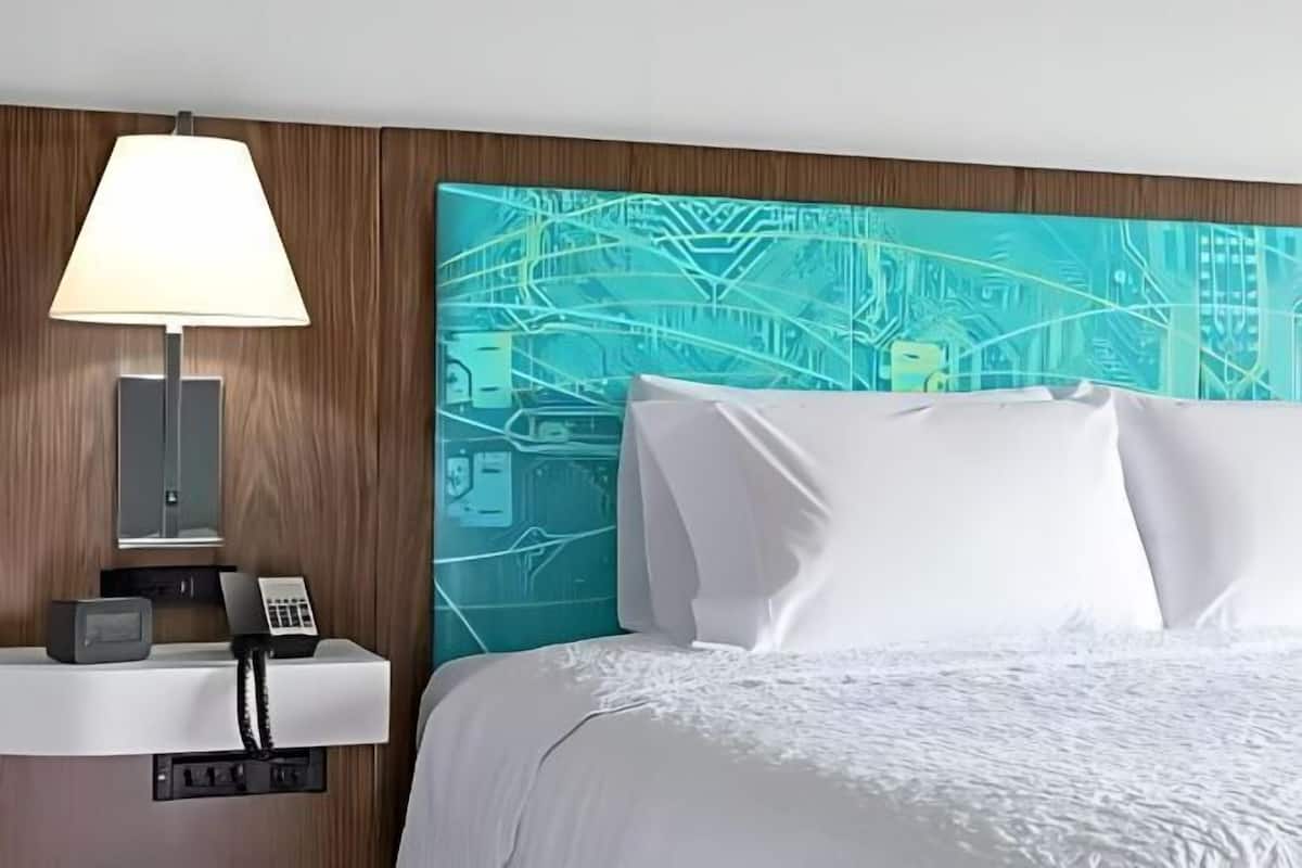 Blackout drapes, iron/ironing board, free cribs/infant beds