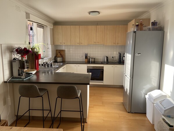 Fridge, microwave, oven, dishwasher - St Kilda Grand Prix apartment (St Kilda)
